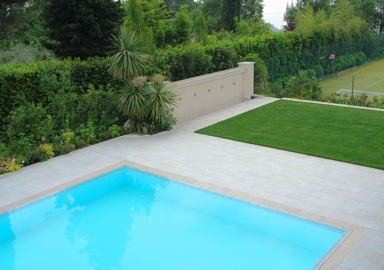 Clean lines covered with light coloured stone - Swimming Pools
